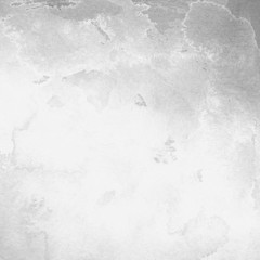 Silver with gray ink and watercolor texture on white paper background. Paint leaks and ombre effects. Hand painted abstract image.