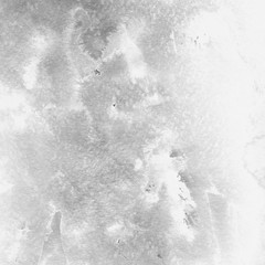 Silver with gray ink and watercolor texture on white paper background. Paint leaks and ombre effects. Hand painted abstract image. © artistmef