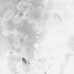 Silver with gray ink and watercolor texture on white paper background. Paint leaks and ombre effects. Hand painted abstract image. © artistmef
