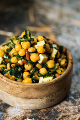 chickpea salad, with spinach, pine nuts and cheese