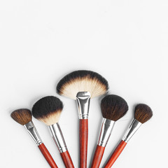 Makeup brush set, professional makeup tools, brushes for different functions on white background