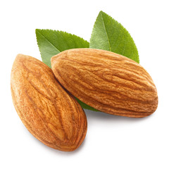 Close-up of two almonds, isolated on white background