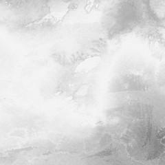 Silver with gray ink and watercolor texture on white paper background. Paint leaks and ombre effects. Hand painted abstract image.