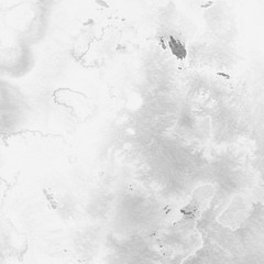 Silver with gray ink and watercolor texture on white paper background. Paint leaks and ombre effects. Hand painted abstract image. © artistmef