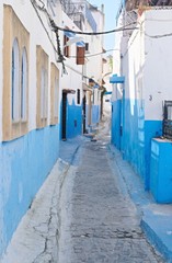Fototapeta na wymiar Blue city Chefchaouen street. Chefchaouen or Chaouen city in Morocco North Africa. Blue house walls on the street of an ancient city, blue color everywhere.