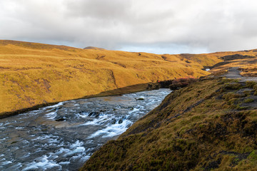 Rapids along a Mountain River in Iceland on a Sunny Autumn Day