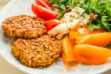 Baked vegan burgers with beans and seeds, vegetables and herbs. Healthy lifestyle and balanced food concept. Horizontal.