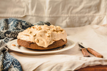 Cream Snickers Pie. Chocolate Sponge Cake filled with whipped cream and peanuts.