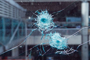 Bullet hole in glass. © IV. Murat
