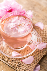 Cherry blossom herb tea on table. sakura © ddukang