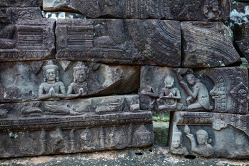 Stunning bas relief sculptures celebrating hindu and buddhist figures captured at Bayon temple in the Angkor Thom temple complex, Siem Reap, Cambodia