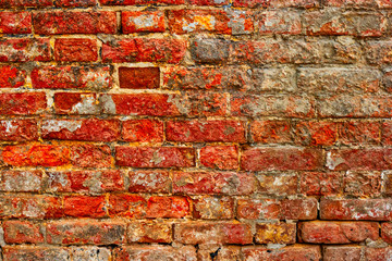 Worn Obsolete Red Brick Wall