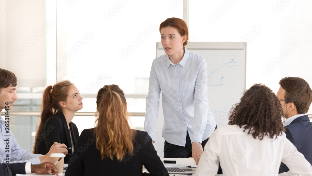 Sticker serious female boss manager coach leading corporate group meeting