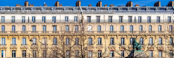 Fototapeta na wymiar Paris, beautiful buildings in the center, typical parisian facades boulevard de Villiers 