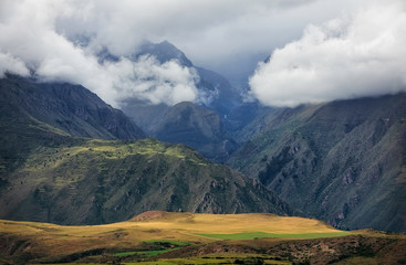 Stunning view of the Andes mountains and autumn  fields in Peru. Districts of Cusco. South America