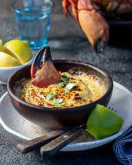 CHILEAN FOOD.  Baked crabmeat crab meat with cheese, cream and bread.  Traditional dish of chilean coast. Pastel o chupe de jaiba.