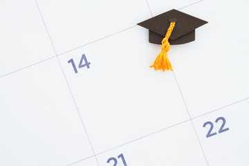 Monthly calendar with a grad hat