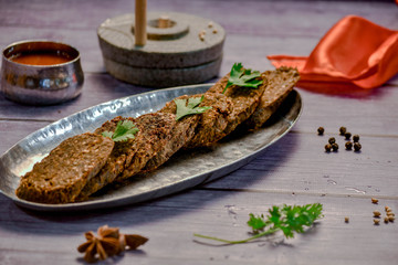 Kothimbir Wadi Popular Maharashtrian snack made with a combination of fresh coriander leaves, gram flour and yogurt.