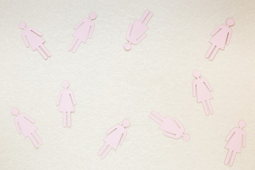 Female gender icons on table