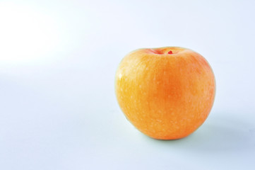 yellow apple on white background