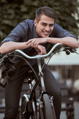 Obraz premium Man with bicycle