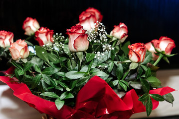 beautiful rich bouquet of red roses at wedding ceremony, gift concept