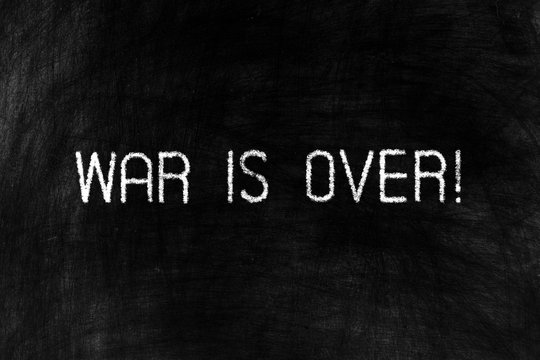War is Over on Grunge Chalkboard Background.