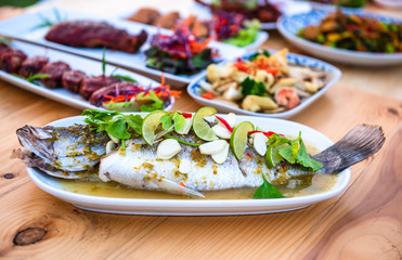 Steamed sea bass steamed with lemon sauce