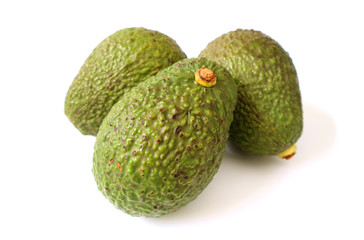 Obraz premium Three Fresh Ripe Avocado Whole Fruits Isolated on White Background