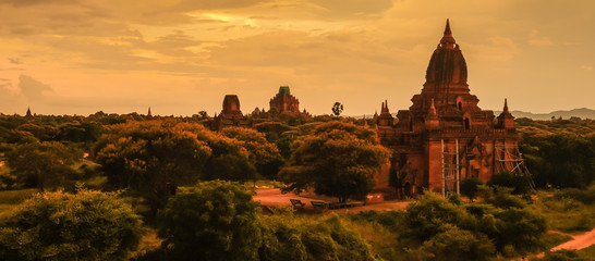 Fototapeta na wymiar Beautiful morning ancient temples and pagoda in the Archaeological Zone, landmark and popular for tourist attractions and destination in Bagan, Myanmar. Asia Travel concept