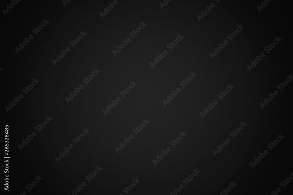 Wall mural black gradient texture background with grain.