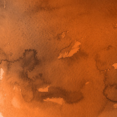 Orange with brown ink and watercolor textures on white paper background. Paint leaks and ombre effects. Hand painted abstract image.