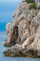 Capo Caccia nature reserve, a rocky outcrop set in a protected ecosystem near the town of Alghero, Sardinia, Italy. featuring. Scenic hiking routes, diving sites & caverns with archaeological remains