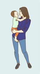 A young woman holds a child in her arms.