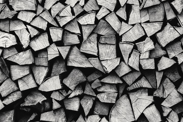 natural stocked firewood in a pile, wooden abstract background, energy enviroment concept