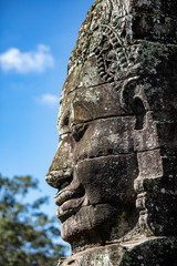 Beautiful face sculptures at the famous Bayon temple in the Angkor Thom temple complex, Siem Reap, Cambodia