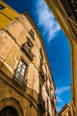 Narrow, canyon like streets in the medieval Castello quarter of Cagliari, Sardinia, Italy. An...