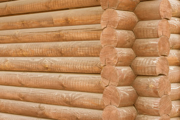 wooden frame. part of the wall of the stacked logs. construction, architecture.
