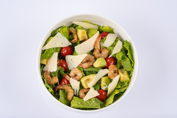 salad of shrimp and avocado, served in white bowl