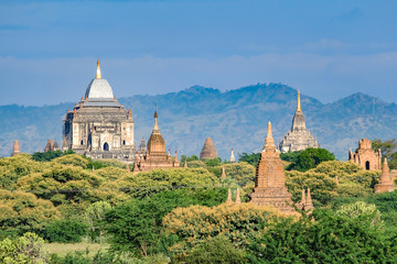 Fototapeta premium Beautiful morning ancient temples and pagoda in the Archaeological Zone, landmark and popular for tourist attractions and destination in Bagan, Myanmar. Asia Travel concept