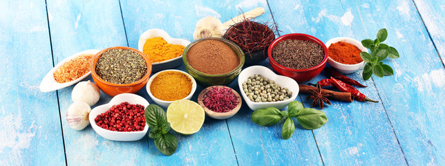 Spices and herbs variation on table. Food and cuisine ingredients.