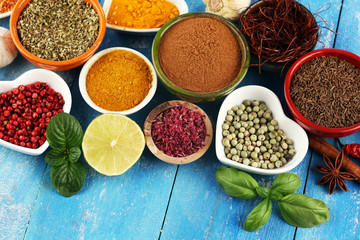 Spices and herbs variation on table. Food and cuisine ingredients.