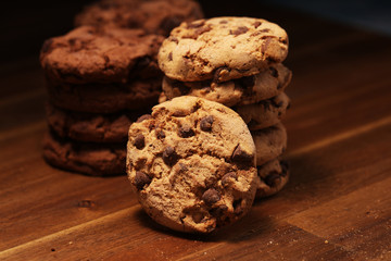 Chocolate cookies on wooden table. Chocolate chip cookies
