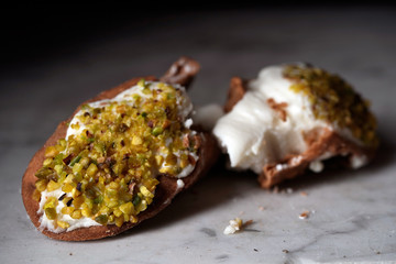 Close up of a Sicilian cannolo