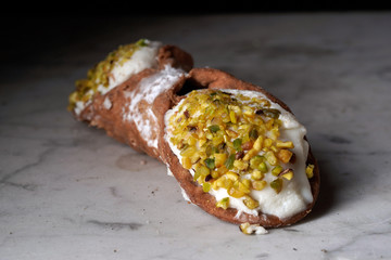 Close up of a Sicilian cannolo