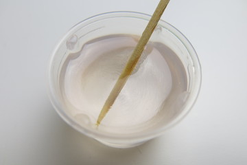 Liquid epoxy resin in a container