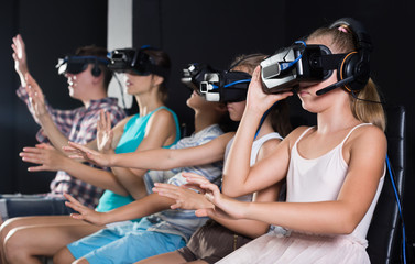 Parents with children  in the room of virtual reality