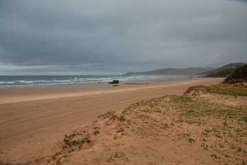 Lonely beach landscape a cloudy day in northern Spain