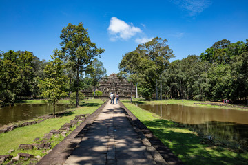 Angkor Wat, Cambodia September 6th 2018 : Tourists walking towards the famous Baphuon temple at Angkor Thom, Siem Reap, Cambodia