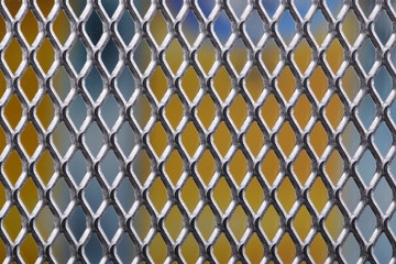 Metal mesh as a structure and background with different orientation and background color.